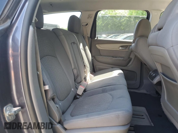 2014 Chevrolet Traverse LS z VIN 1GNKVFEDXEJ123578, wystawiony jako Copart lot #57697115 z przebiegiem 112 680 mil mil oraz Szkoda całkowita • Salvage title. Historia ofert i sprzedaży dostępna na DreamBid. Obrazek 11.
