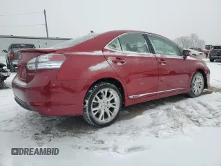 2010 Lexus HS 250h with VIN JTHBB1BA9A2005121, listed as a Copart auction lot 87825175 with 124,594 mi miles and Salvage Title. Bid and sale history available at DreamBid. Image 3.