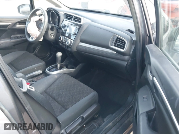 2015 Honda Fit LX with VIN 3HGGK5H5XFM719477, listed as a IAAI auction lot 41671194 with 145,876 mi miles. Bid and sale history available at carsss.com. Image 5.
