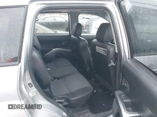 2009 Mitsubishi Outlander SE z VIN JA4MT31W89Z003101, wystawiony jako IAAI lot #41487678 z przebiegiem 90 226 mil mil oraz . Historia ofert i sprzedaży dostępna na DreamBid. Obrazek 8.