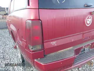 2005 Cadillac Escalade z VIN 1GYEC63T45R130737, wystawiony jako IAAI lot #41668213 z przebiegiem 242 755 mil mil oraz . Historia ofert i sprzedaży dostępna na DreamBid. Obrazek 6.