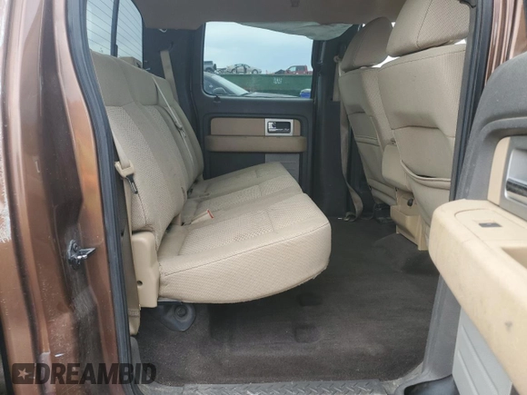 2011 Ford F-150 XLT with VIN 1FTFW1ETXBFB51042, listed as a Copart auction lot 51473695 with 179,195 mi miles and Salvage Title. Bid and sale history available at carsss.com. Image 10.