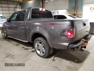 2002 Ford F-150 Harley Davidson with VIN 1FTRW07392KE05237, listed as a Copart auction lot 87451334 with 175,986 mi miles and Salvage Title. Bid and sale history available at carsss.com. Image 2.