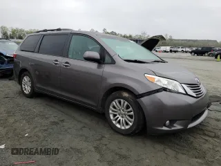 2015 Toyota Sienna XLE with VIN 5TDYK3DC6FS660035, listed as a Copart auction lot 51660075 with 176,968 mi miles and Salvage Title. Bid and sale history available at DreamBid. Image 4.