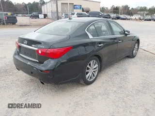 2015 Infiniti Q50 Premium z VIN JN1BV7ARXFM410177, wystawiony jako IAAI lot #41936999 z przebiegiem 129 123 mil mil oraz . Historia ofert i sprzedaży dostępna na DreamBid. Obrazek 4.