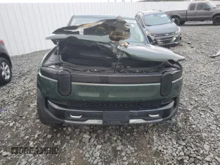 2024 Rivian R1T Adventure z VIN 7FCTGCAA1RN030829, wystawiony jako Copart lot #81459854 z przebiegiem Nie podano mil oraz Szkody całkowita. Historia ofert i sprzedaży dostępna na DreamBid. Obrazek 5.