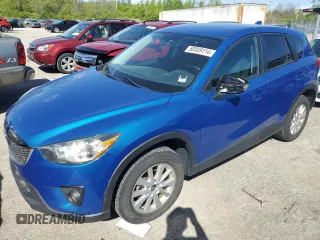 2014 Mazda CX-5 Touring with VIN JM3KE2CY8E0380839, listed as a Copart auction lot 50359114 with 150,668 mi miles and Salvage Title. Bid and sale history available at carsss.com. Image 1.