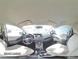 2015 Mazda 5 Sport z VIN JM1CW2BL1F0178961, wystawiony jako Copart lot #49853755 z przebiegiem 154 980 mil mil oraz Szkoda całkowita • Salvage title. Historia ofert i sprzedaży dostępna na DreamBid. Obrazek 13.