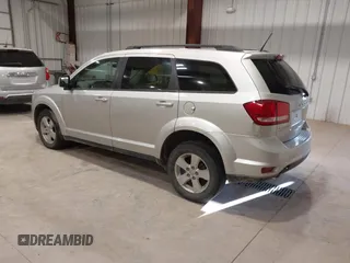 2012 Dodge Journey SXT z VIN 3C4PDDBGXCT257498, wystawiony jako IAAI lot #41746098 z przebiegiem 197 796 mil mil oraz . Historia ofert i sprzedaży dostępna na DreamBid. Obrazek 3.