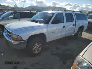 2001 Dodge Dakota z VIN 1B7HG2AX01S229161, wystawiony jako Copart lot #44562925 z przebiegiem 151 690 mil mil oraz Czysty tytuł • Clean title. Historia ofert i sprzedaży dostępna na DreamBid. Obrazek 1.