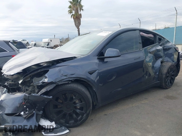 2023 Tesla Model Y Long Range with VIN 7SAYGDEE4PA028440, listed as a IAAI auction lot 41488136 with 29,229 mi miles and . Bid and sale history available at DreamBid. Image 13.