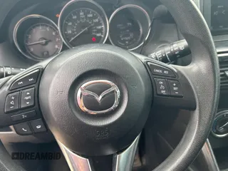 2013 Mazda CX-5 Sport with VIN JM3KE4BE7D0141588, listed as a Copart auction lot 66138585 with 124,920 mi miles and Clean title. Bid and sale history available at DreamBid. Image 12.
