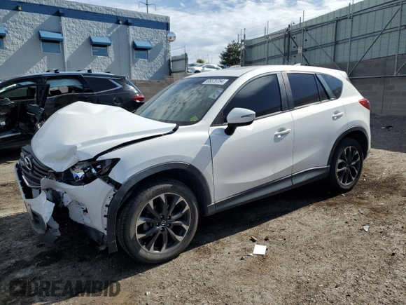 2016 Mazda CX-5 Grand Touring with VIN JM3KE2DY0G0888854, listed as a Copart auction lot 68379754 with 73,096 mi miles and Salvage Title. Bid and sale history available at carsss.com. Image 1.