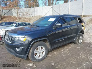 2015 Jeep Grand Cherokee Laredo with VIN 1C4RJFAG9FC909753, listed as a IAAI auction lot 41705871 with 120,000 mi miles. Bid and sale history available at carsss.com. Image 2.