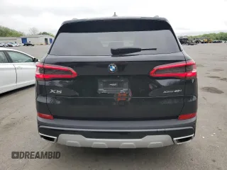 2020 BMW X5 xDrive40i z VIN 5UXCR6C05LLL82092, wystawiony jako Copart lot #55385695 z przebiegiem 28 599 mil mil oraz Szkoda całkowita • Salvage title. Historia ofert i sprzedaży dostępna na DreamBid. Obrazek 6.