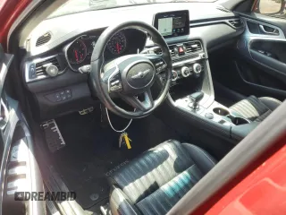 2021 Genesis G70 3.3T with VIN KMTG74LE2MU074173, listed as a Copart auction lot 58236675 with 65,665 mi miles and Salvage title. Bid and sale history available at DreamBid. Image 8.