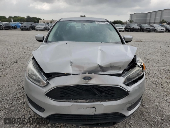 2018 Ford Focus SE with VIN 1FADP3F28JL256318, listed as a Copart auction lot 55524544 with 136,723 mi miles and Salvage title. Bid and sale history available at DreamBid. Image 5.