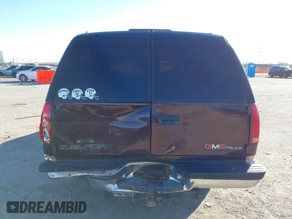 1997 GMC Suburban z VIN 1GKEC16RXVJ703491, wystawiony jako IAAI lot #41219414 z przebiegiem 362 551 mil mil oraz . Historia ofert i sprzedaży dostępna na DreamBid. Obrazek 16.