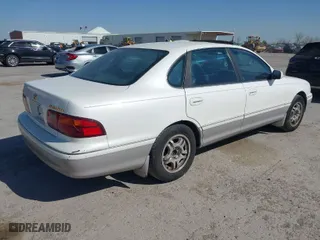 1999 Toyota Avalon XL with VIN 4T1BF18B4XU297663, listed as a IAAI auction lot 41824947 with NaN miles. Bid and sale history available at carsss.com. Image 4.