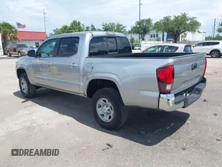 2023 Toyota Tacoma SR with VIN 3TYAX5GN0PT090132, listed as a IAAI auction lot 42472501 with 28,979 mi miles and . Bid and sale history available at DreamBid. Image 3.