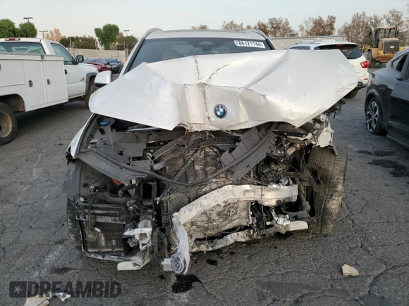2024 BMW X5 xDrive50e with VIN 5UX43EU07R9S99719, listed as a Copart auction lot 86121144 with 0 mi miles and Salvage Title. Bid and sale history available at carsss.com. Image 5.