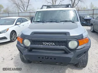 2007 Toyota FJ Cruiser with VIN JTEBU11F270030712, listed as a IAAI auction lot 42076564 with 265,000 mi miles. Bid and sale history available at carsss.com. Image 12.