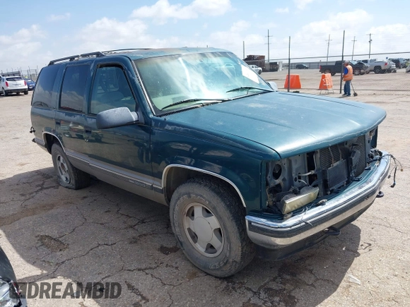1998 GMC Yukon z VIN 1GKEK13R3WJ715863, wystawiony jako IAAI lot #42410130 z przebiegiem 154 139 mil mil oraz . Historia ofert i sprzedaży dostępna na DreamBid. Obrazek 1.