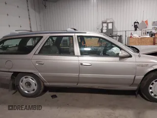 1994 Mercury Sable z VIN 1MELM5848RG607787, wystawiony jako IAAI lot #41938845 z przebiegiem 135 611 mil mil oraz . Historia ofert i sprzedaży dostępna na DreamBid. Obrazek 13.
