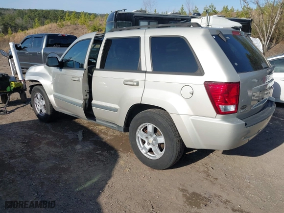 2007 Jeep Grand Cherokee Laredo with VIN 1J8GS48K17C516150, listed as a IAAI auction lot 41752720 with 176,114 mi miles. Bid and sale history available at carsss.com. Image 3.