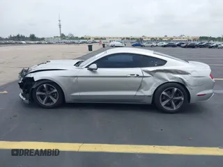2015 Ford Mustang V6 z VIN 1FA6P8AM1F5316868, wystawiony jako IAAI lot #42618687 z przebiegiem 93 238 mil mil oraz . Historia ofert i sprzedaży dostępna na DreamBid. Obrazek 15.