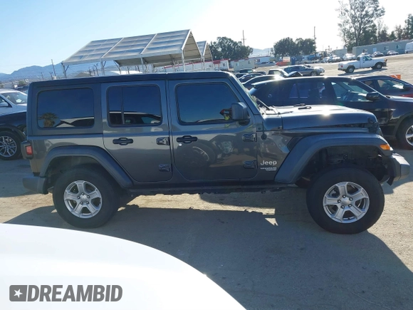 2018 Jeep Wrangler Unlimited Sport S z VIN 1C4HJXDG4JW132547, wystawiony jako IAAI lot #41838010 z przebiegiem 69 987 mil mil oraz . Historia ofert i sprzedaży dostępna na DreamBid. Obrazek 13.