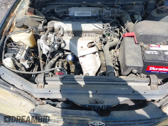 1995 Toyota Camry LE z VIN 4T1SK12E3SU576500, wystawiony jako IAAI lot #42186816 z przebiegiem 216 809 mil mil oraz . Historia ofert i sprzedaży dostępna na DreamBid. Obrazek 10.