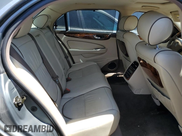 2006 Jaguar XJ Vanden Plas with VIN SAJWA82BX6SH09069, listed as a Copart auction lot 68122604 with 153,999 mi miles and Salvage Title. Bid and sale history available at carsss.com. Image 10.