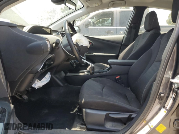 2021 Toyota Prius LE z VIN JTDKAMFPXM3174518, wystawiony jako Copart lot #58854495 z przebiegiem 83 445 mil mil oraz Szkoda całkowita • Salvage title. Historia ofert i sprzedaży dostępna na DreamBid. Obrazek 7.