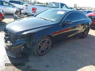 2016 Mercedes-Benz E 400 with VIN WDDKJ6FB3GF320475, listed as a IAAI auction lot 42324564 with 132,182 mi miles and . Bid and sale history available at DreamBid. Image 2.