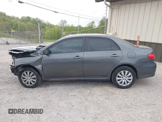 2012 Toyota Corolla L with VIN 2T1BU4EE3CC901530, listed as a IAAI auction lot 42099048 with 210,117 mi miles. Bid and sale history available at carsss.com. Image 15.