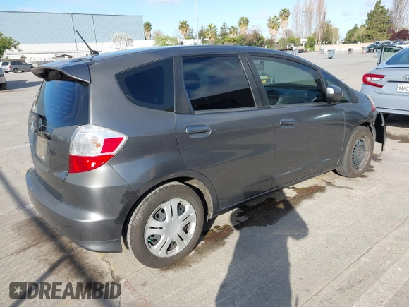 2013 Honda Fit with VIN JHMGE8H32DC018130, listed as a IAAI auction lot 41980172 with 98,452 mi miles. Bid and sale history available at carsss.com. Image 4.