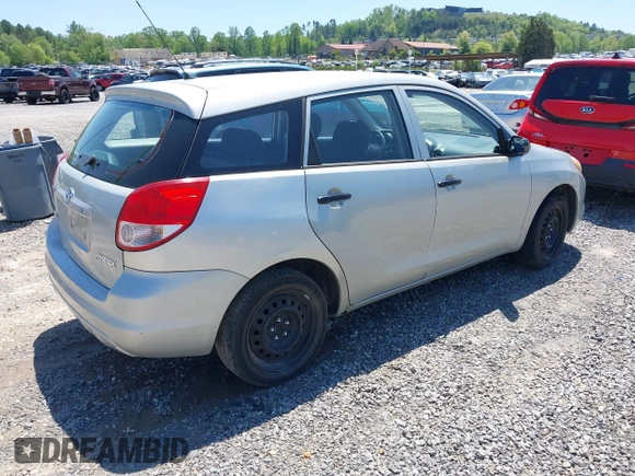 2004 Toyota Matrix Std with VIN 2T1KR32E04C292673, listed as a IAAI auction lot 42141653 with 299,999 mi miles. Bid and sale history available at carsss.com. Image 4.