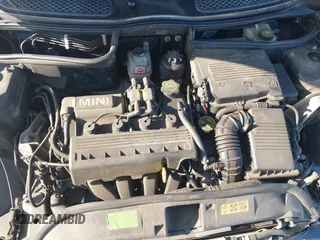 2006 MINI Hardtop with VIN WMWRC33586TJ75043, listed as a IAAI auction lot 41948235 with 138,402 mi miles and . Bid and sale history available at DreamBid. Image 10.