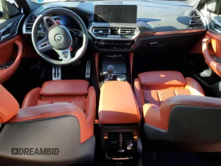 2024 BMW X4 M z VIN 5YM23EC01R9W18369, wystawiony jako Copart lot #82886254 z przebiegiem Nie podano mil oraz Szkoda całkowita • Salvage title. Historia ofert i sprzedaży dostępna na DreamBid. Obrazek 8.