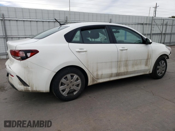 2023 Kia Rio LX with VIN 3KPA24AD0PE566085, listed as a Copart auction lot 50354455 with 65,203 mi miles and Salvage Title. Bid and sale history available at DreamBid. Image 3.