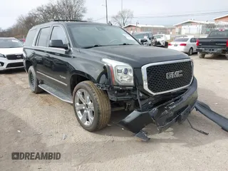 2016 GMC Yukon SLT with VIN 1GKS1BKC3GR272738, listed as a IAAI auction lot 41712439 with 169,726 mi miles. Bid and sale history available at carsss.com. Image 1.