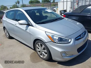 2014 Hyundai Accent SE z VIN KMHCU5AE1EU141986, wystawiony jako IAAI lot #42361098 z przebiegiem 119 252 mil mil oraz . Historia ofert i sprzedaży dostępna na DreamBid. Obrazek 1.