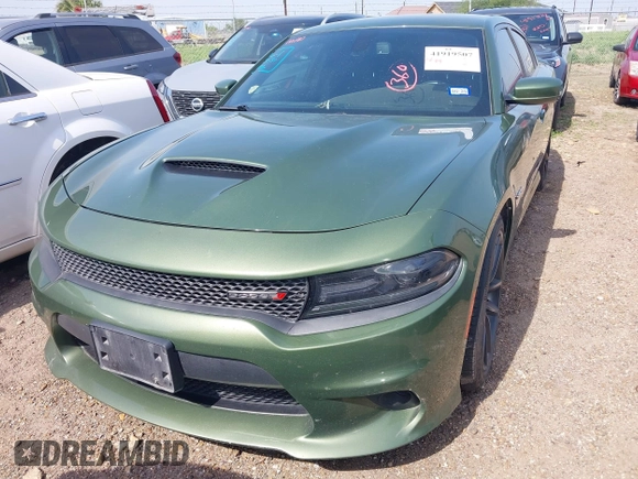 2021 Dodge Charger R/T with VIN 2C3CDXCT4MH522734, listed as a IAAI auction lot 41919507 with 57,825 mi miles and . Bid and sale history available at carsss.com. Image 6.