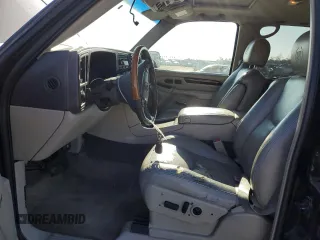 2003 Cadillac Escalade with VIN 1GYEC63T43R157689, listed as a Copart auction lot 88749145 with 138,905 mi miles and Salvage title. Bid and sale history available at DreamBid. Image 7.