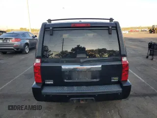 2008 Jeep Commander Limited with VIN 1J8HH58N98C236772, listed as a Copart auction lot 71042404 with 217,780 mi miles and Salvage Title. Bid and sale history available at carsss.com. Image 6.
