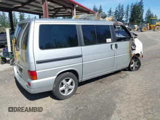 2003 Volkswagen EuroVan MV with VIN WV2MB47073H043489, listed as a IAAI auction lot 42030772 with Not Provided miles and . Bid and sale history available at DreamBid. Image 4.
