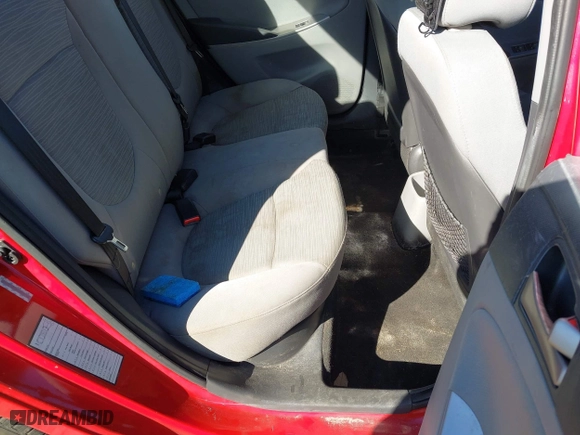 2015 Hyundai Accent GLS with VIN KMHCT4AE8FU833113, listed as a IAAI auction lot 40975977 with 143,038 mi miles. Bid and sale history available at carsss.com. Image 8.