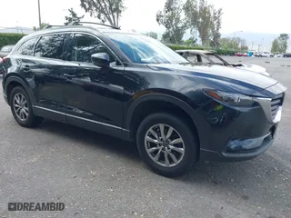 2018 Mazda CX-9 Touring with VIN JM3TCACY9J0234304, listed as a IAAI auction lot 41407496 with 122,824 mi miles. Bid and sale history available at carsss.com. Image 1.