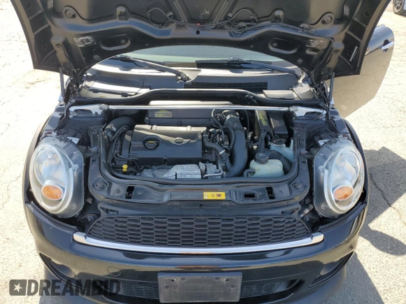 2011 MINI Hardtop S with VIN WMWSV3C57BTY16043, listed as a Copart auction lot 59337575 with 84,617 mi miles and Salvage title. Bid and sale history available at DreamBid. Image 11.